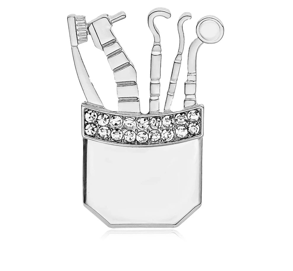 Broche dentista brillos